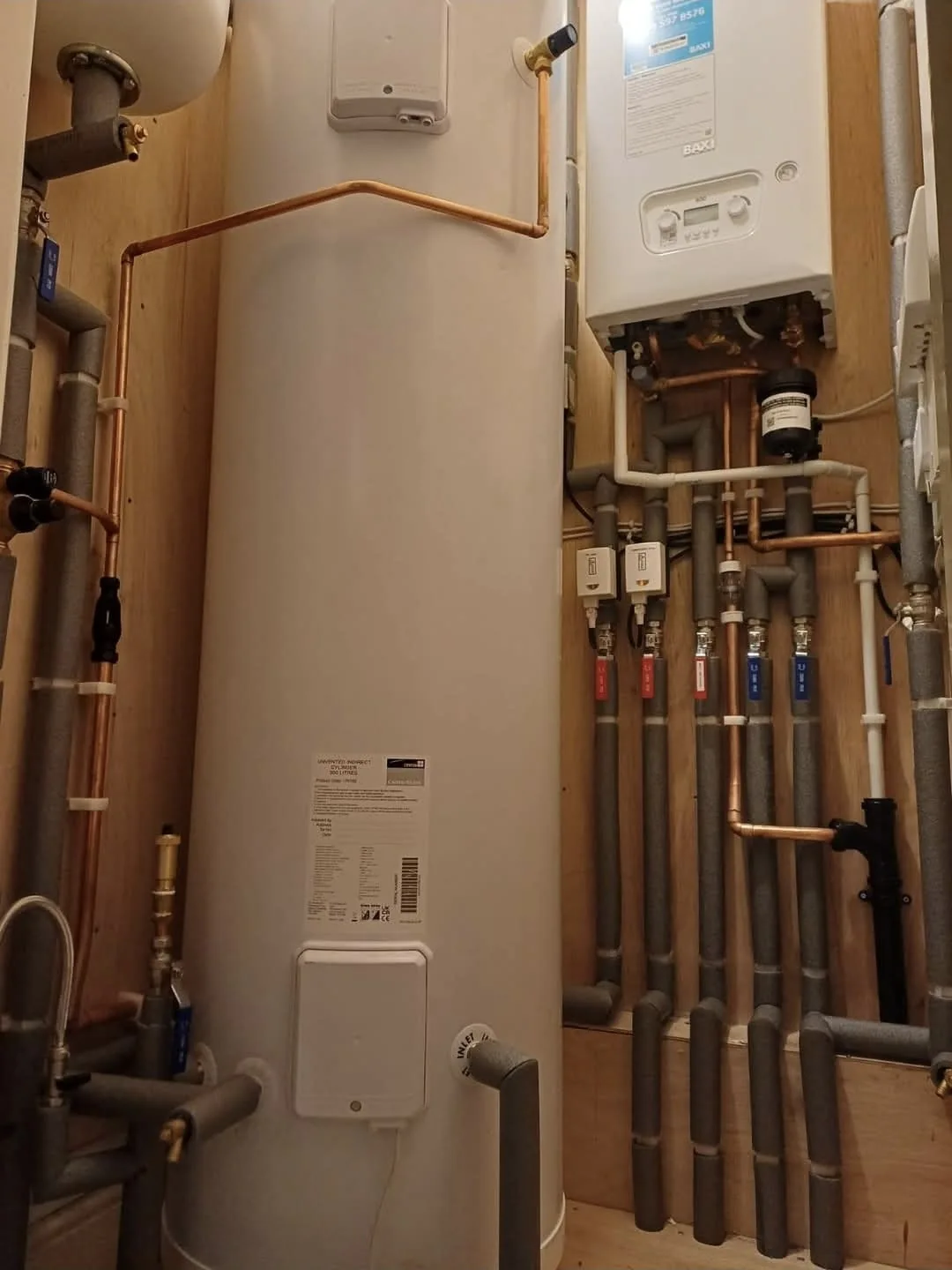 A Baxi boiler and cylinder installation with copper pipework